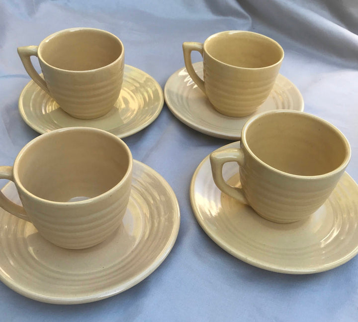 Bauer Ivory Coffee Cup and Saucer, Rare Glaze