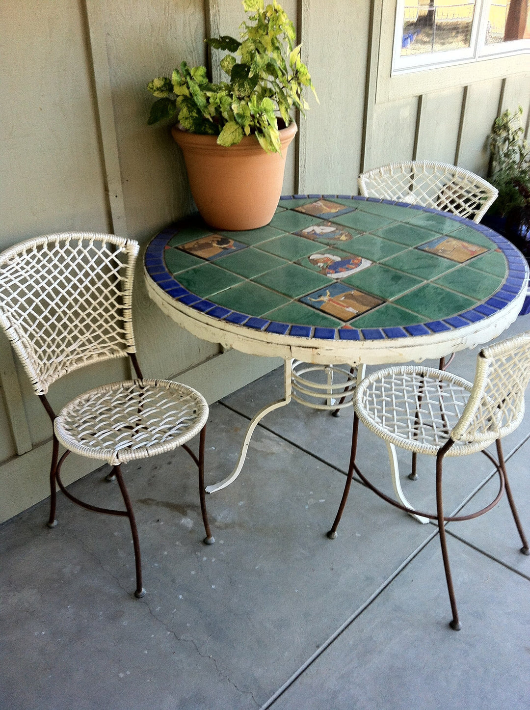 Huge San Jose Tile Patio Table, Wrought iron base, all original.