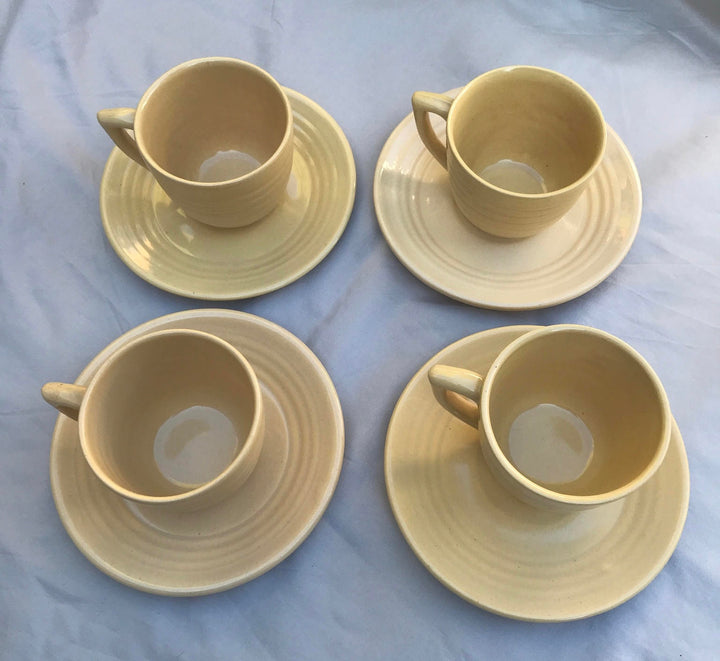 Bauer Ivory Coffee Cup and Saucer, Rare Glaze