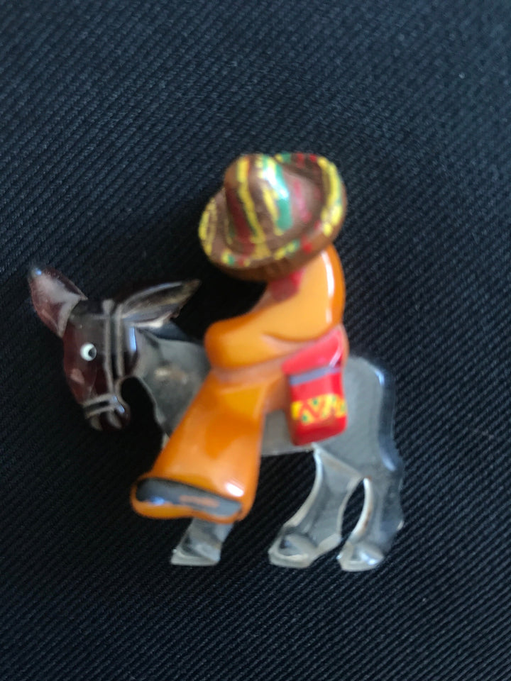 Vintage Bakelite, Lucite & wood Brooch with Señor riding a Burro, Mexicana