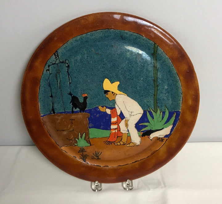 San Jose Plaque, Chicken whisperer & desert scene